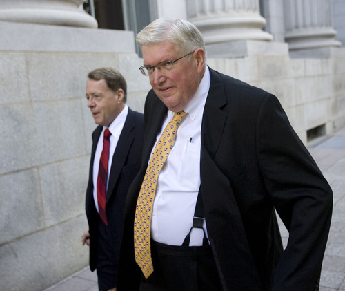 Al Hartmann  |  Tribune file photo
Brigham City physician Dewey C. MacKay, right, convicted on felony counts of illegally prescribing pain medicine, has surrendered his licenses to practice medicine and dispense drugs in Utah. He is pictured here with his lawyer, Peter Stirba, during a 2011 court hearing.